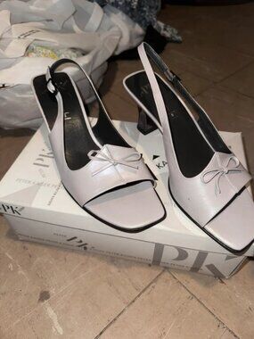 cream heels with bow